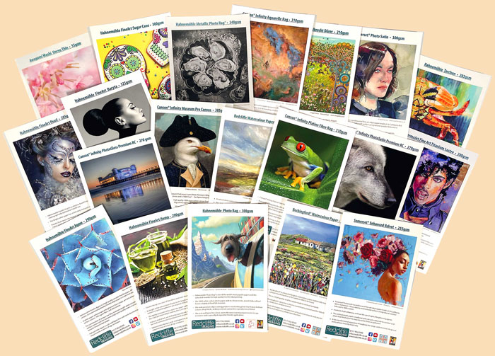 Fanned sample pack showing twenty printed fine art papers — Hahnemühle, Canson Infinity, Somerset, Awagami and more